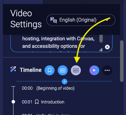 Screenshot of the Timeline and three blue buttons, one for Chapters, one for Captions, and one for Audio Descriptions.  The Audio Description button has a yellow arrow pointing to it.